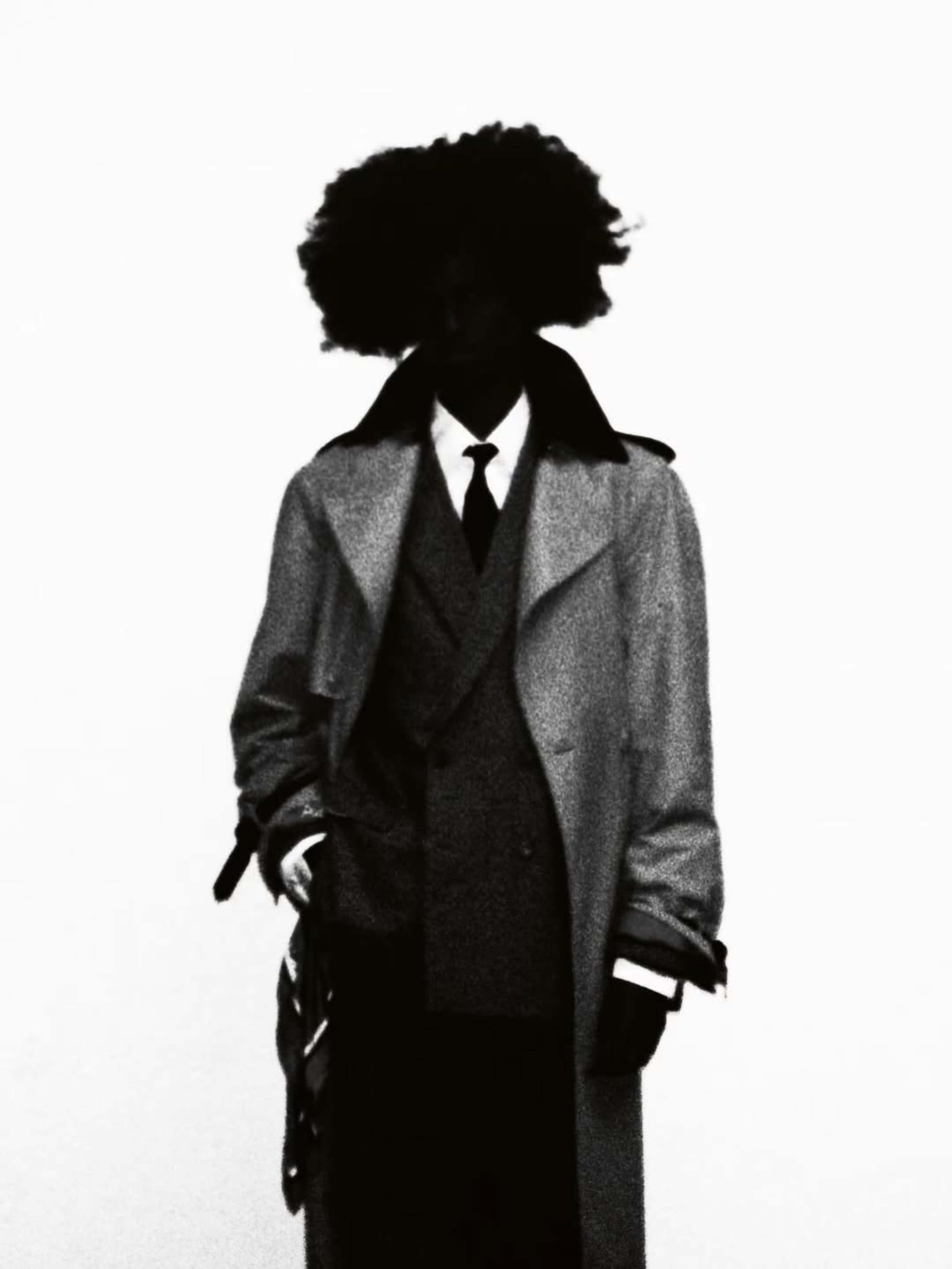 Abdi wearing Sarah Burton's Givenchy AW25 for Another Man Winter/Spring 2026. Photography by Chris Rhodes, styling by Alister Mackie, casting by Jess Hallett.