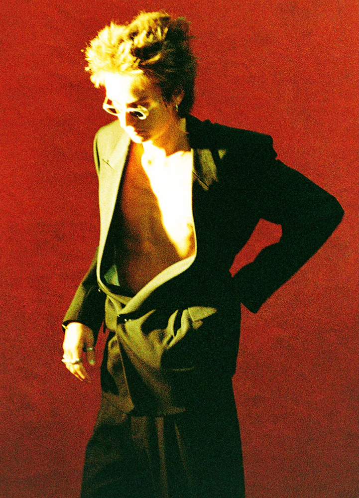 Teo wearing Sarah Burton's Givenchy AW25 for Another Man Winter/Spring 2026. Photography by Chris Rhodes, styling by Alister Mackie, casting by Jess Hallett.